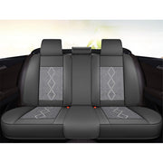 Huse auto premium 5 locuri Carguard Deluxe piele ecologică perforată și textil - negru - alb