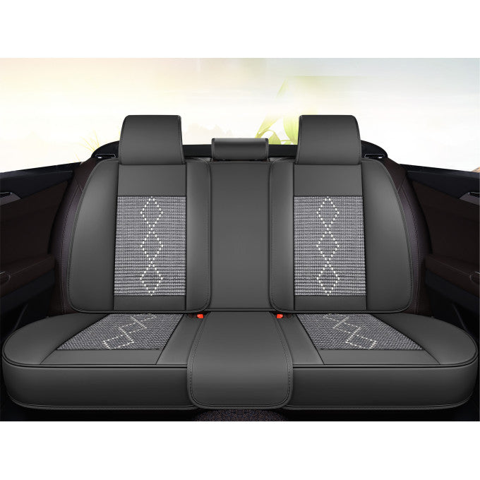 Huse auto premium 5 locuri Carguard Deluxe piele ecologică perforată și textil - negru - alb