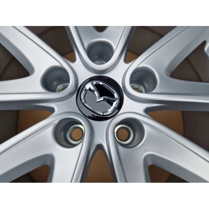 Set 4 capace 55mm Mazda, NEGRU+ARGINTIU, pentru jante aliaj cu inel de fixare