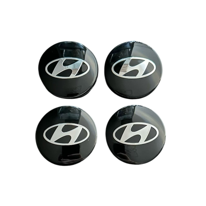 Set 4 capace roti 58mm exterior, 56mm interior Hyundai negre compatibil/inlocuitor janta aliaj