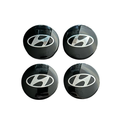 Set 4 capace roti 58mm exterior, 56mm interior Hyundai negre compatibil/inlocuitor janta aliaj