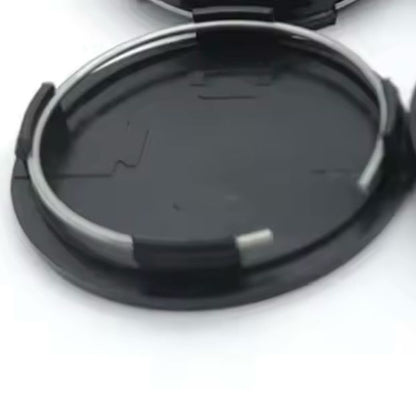 Set 4 capace roti 63mm exterior, 58mm interior Nissan negre compatibil/inlocuitor janta aliaj