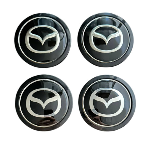 Set 4 capace roti 76mm exterior, 60mm interior Mazda negre compatibil/inlocuitor janta aliaj