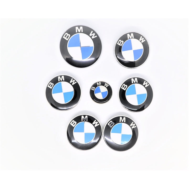 Set embleme BMW 7 piese, alb-albastru, capota/portbagaj 82/74 mm, jante 68mm, volan 44 mm, seria Seria (1,3,5,6,7, X1, X3, X5, X6, E46, E90, E60, F10, F30)