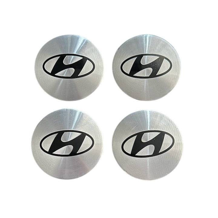 Set 4 capace roti 58mm exterior, 50, 5mm interior Hyundai argintii compatibil/inlocuitor janta aliaj