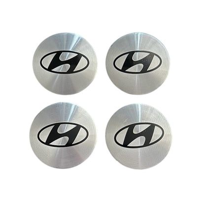 Set 4 capace roti 58mm exterior, 50, 5mm interior Hyundai argintii compatibil/inlocuitor janta aliaj